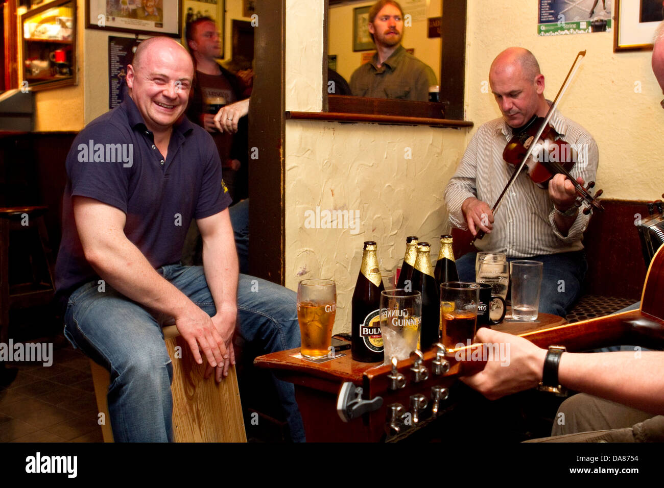 A band playing live music in a Bar in Killarney, Kerry, The Republic of Ireland Stock Photo