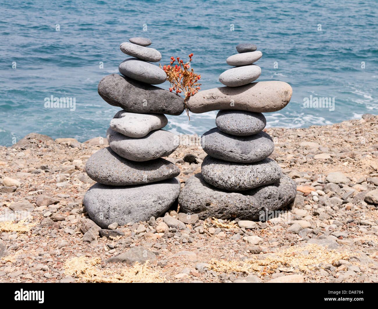 stone sculpture on beach Stock Photo Alamy