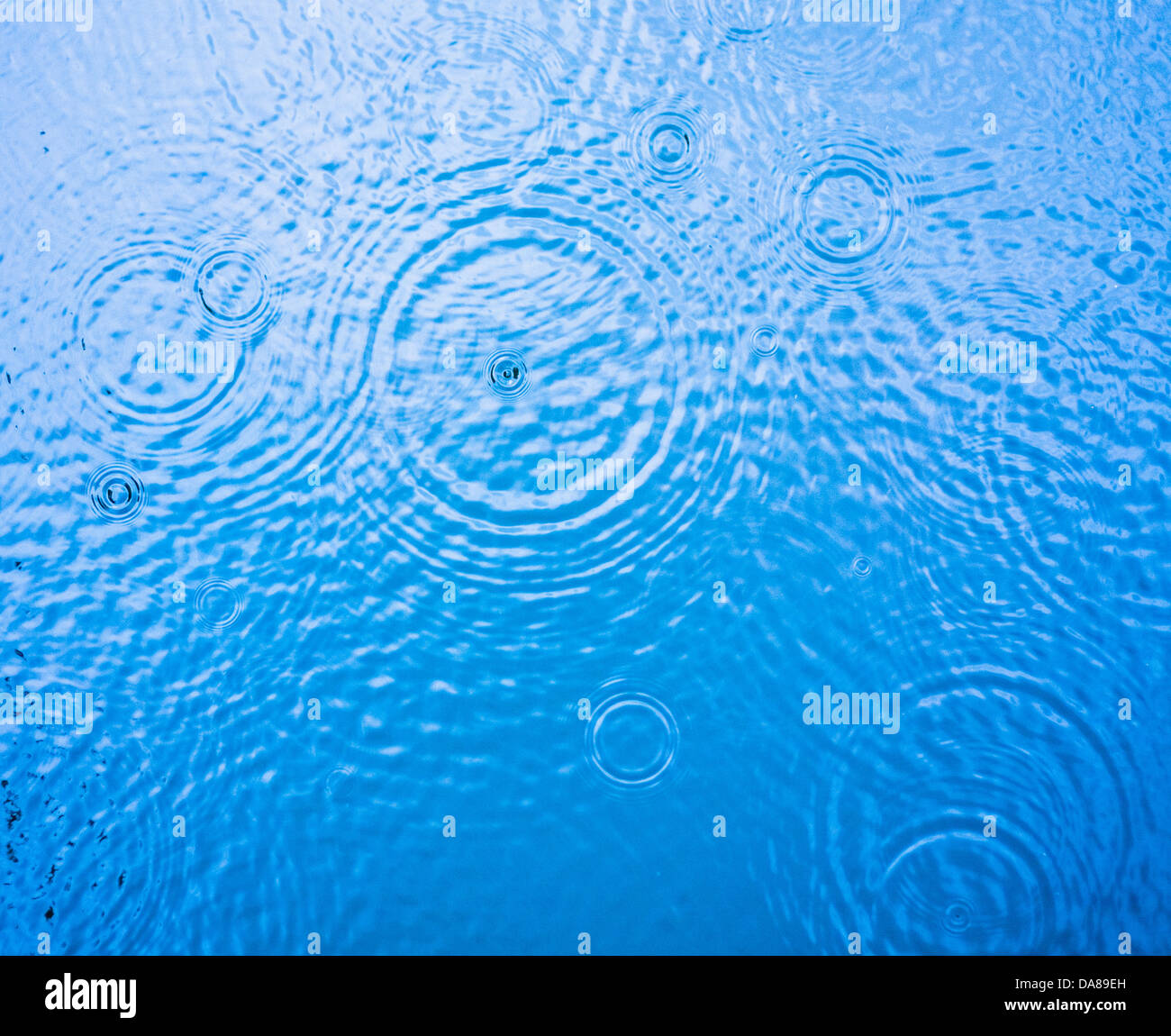 Rippled Water Surface With Drops Stock Photo - Alamy