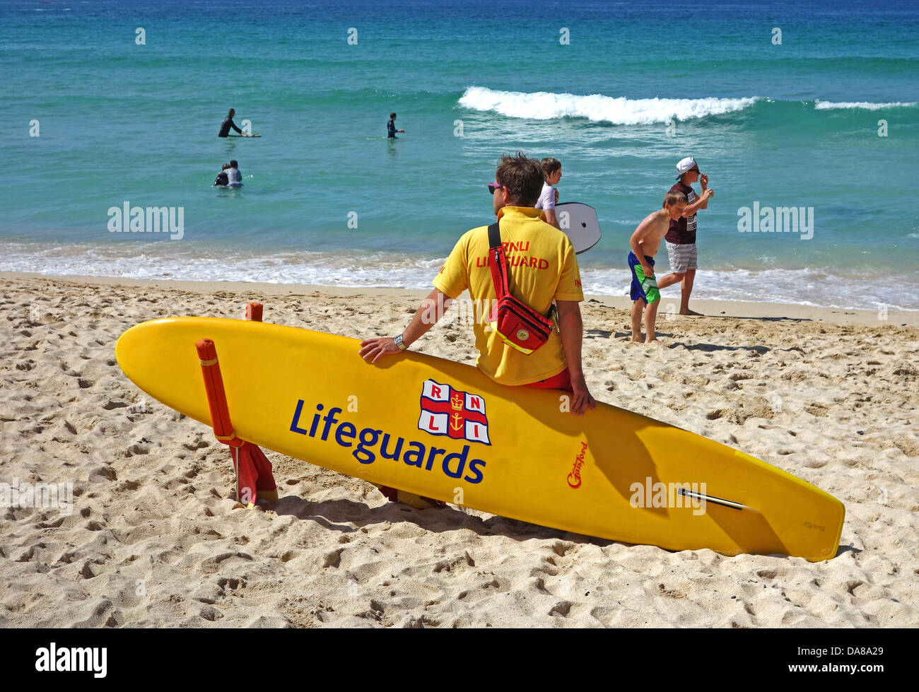 A Lifeguard on watch at Porthmeor beach in St.Ives, Cornwall, uk Stock Photo