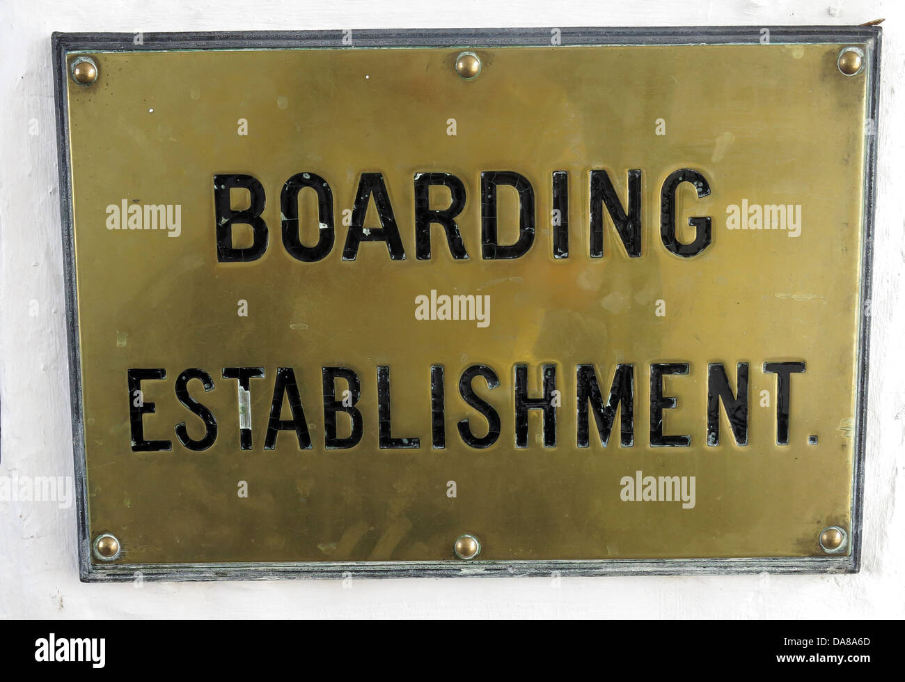 An old brass sign of an official boarding establishment IE an hotel or B&B ( bed and breakfast ) in Dorchester on Thames Stock Photo