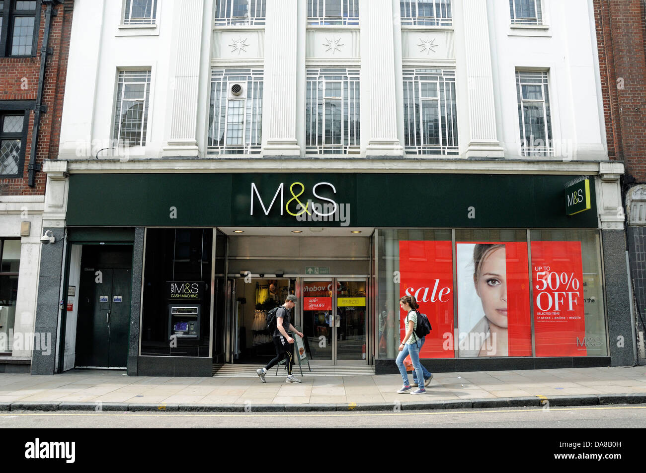 People passing M & S or Marks and Spencer, Angel, Islington, London England UK Stock Photo