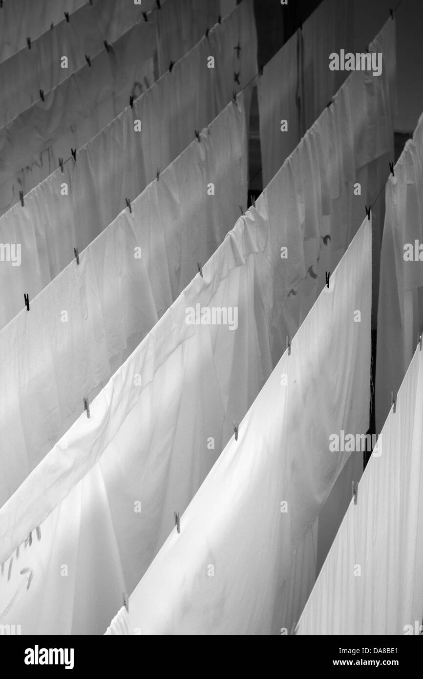 Clothespin with white sheet, France Stock Photo Alamy