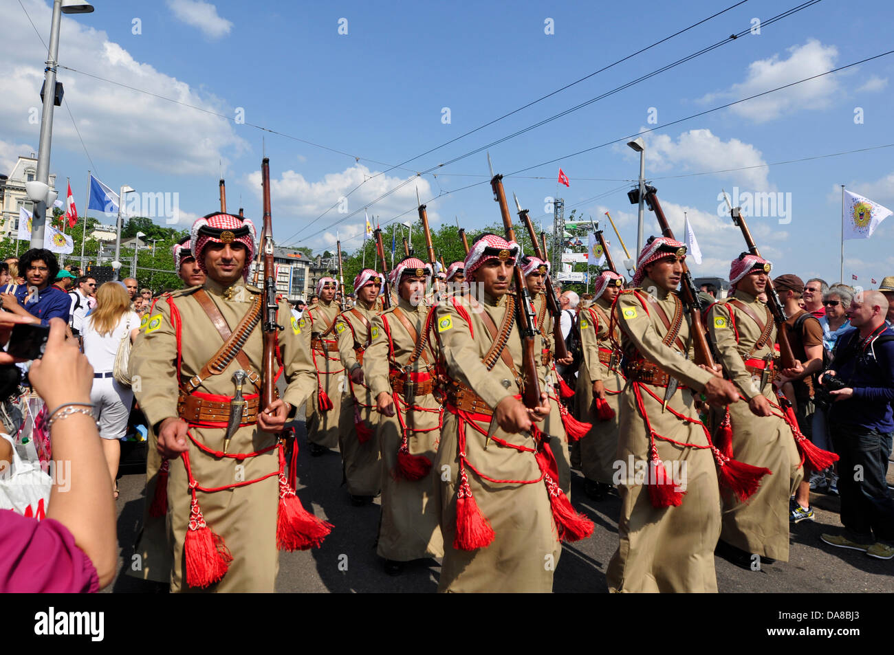 Zurich, Switzerland, 7th July 2013, in the center of Zurich,  one of the biggest European festival continues into the third day. Parties, Carnival, fairground attractions, market, food and drink stands everywhere.  - show of Saudi guard of honour Credit:  momo leif/Alamy Live News Stock Photo