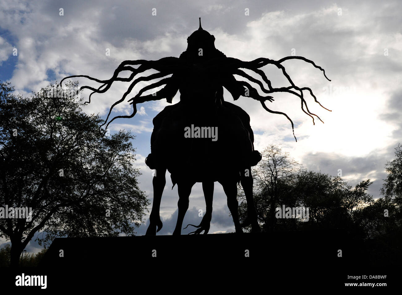 A statue of Ghengis Khan in silhouette, Marble Arch, London, UK Stock Photo