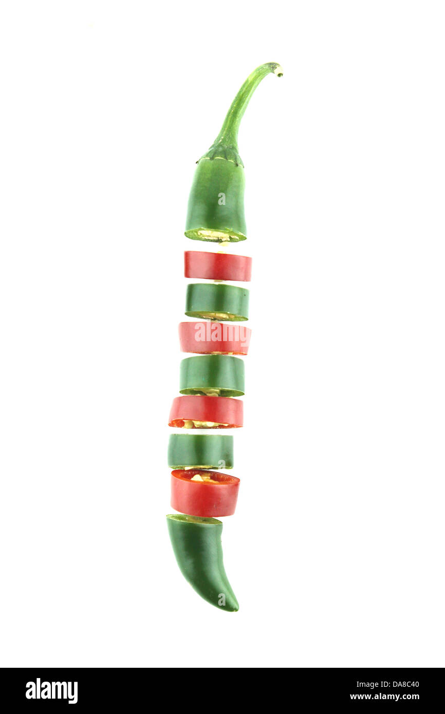 red and green hot chili pepper slices on a white background Stock Photo ...