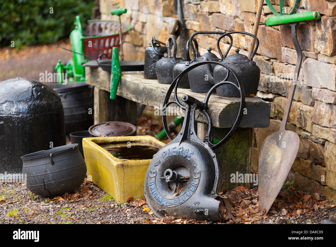 A peat cutters tools and domestic displayed outside a cottage at the