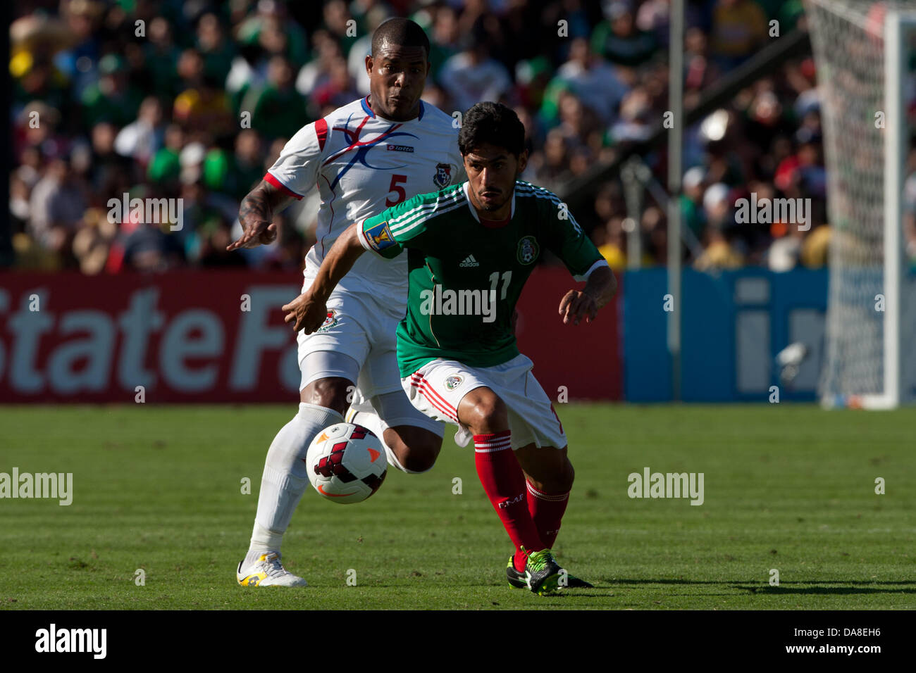 Pasadena, California, USA. 7th July, 2013. Rafael Marquez #11 of Mexico and Roman Torres #5 of Panama in action during the 2013 CONCACAF Gold Cup game between Mexico and Panama on July 7, 2013 at the Rose Bowl in Pasadena, Ca. Credit:  Brandon Parry / Newsport/Alamy Live News Stock Photo