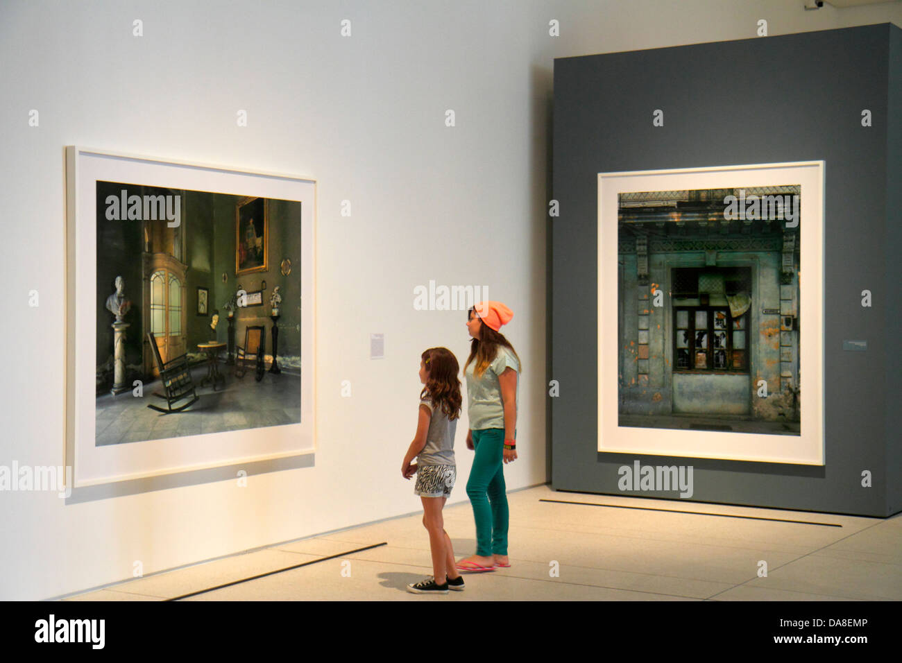 Florida,Tampa,Tampa Museum of Art,gallery,interior inside,looking,appreciating,photographs,teen teens teenager teenagers girl girls,youngster,female k Stock Photo