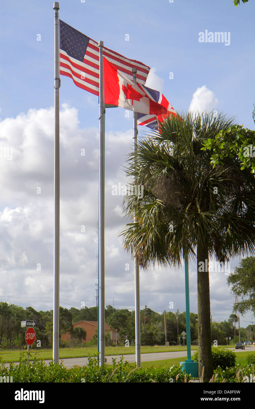 Naples Florida,flags,Canadian,UK,England,visitors travel traveling tour tourist tourism landmark landmarks culture cultural,vacation group people pers Stock Photo