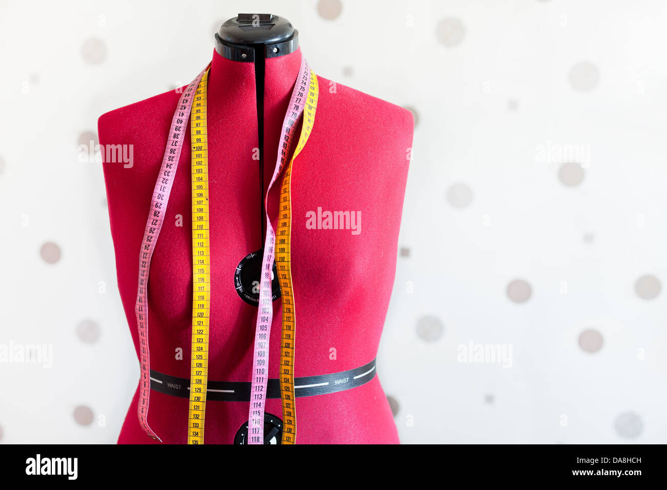 tailors model dummy with two measure tapes Stock Photo Alamy