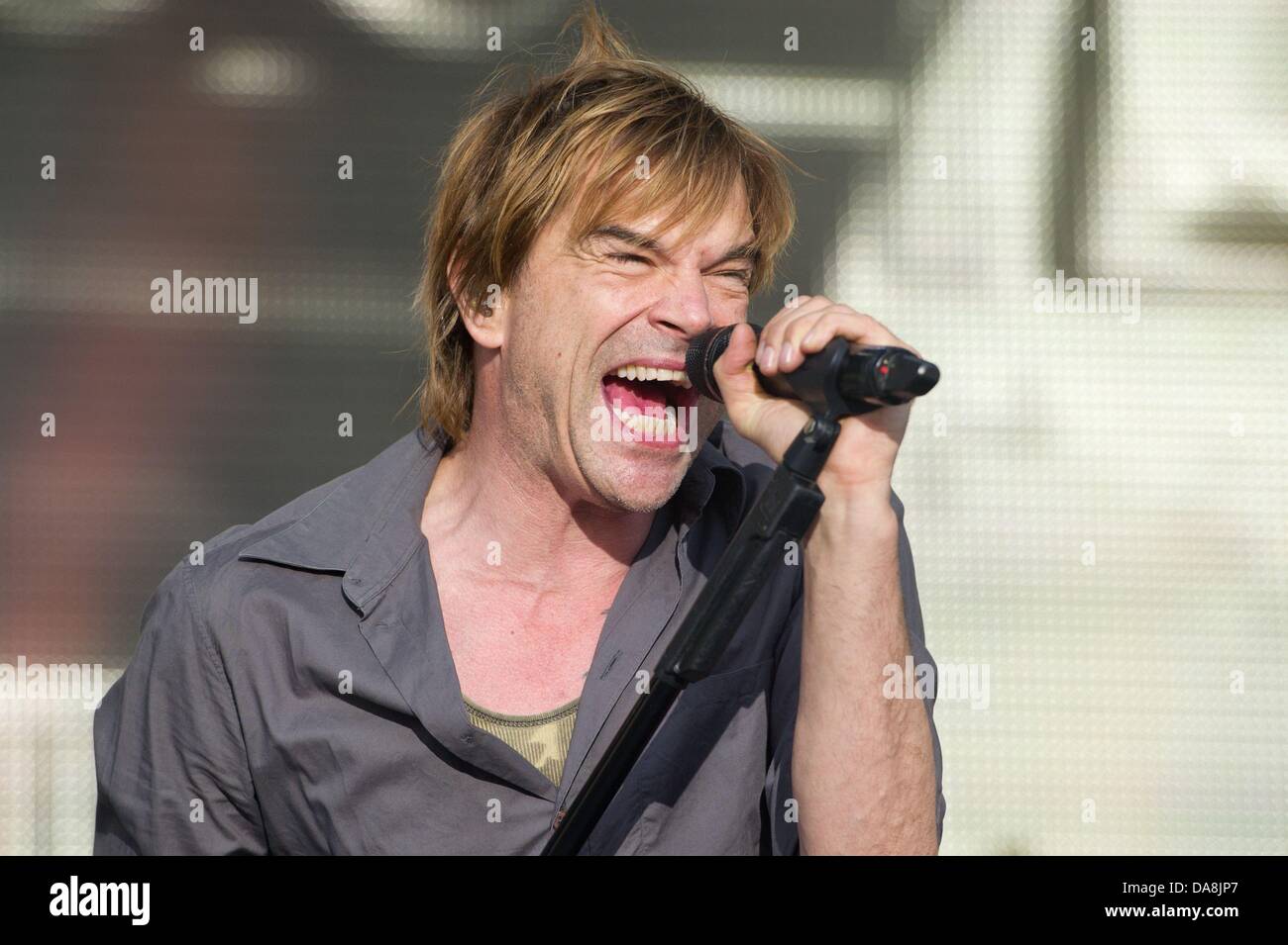 Campino, Singer of German group Die Toten Hosen, stands on the grounds of  the lakeland festival in Lausitz region at lake Partwitzer See near  Hoyerswerda, Germany, 07 July 2013. 14 artists and