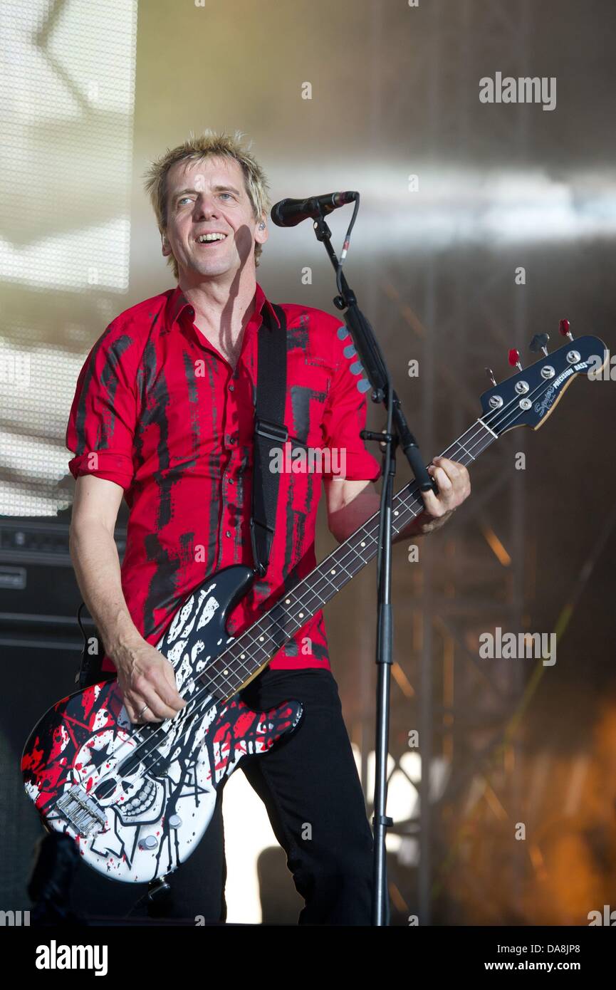Andreas Meurer, bass player of German group Die Toten Hosen, performs on  the grounds of the lakeland festival in Lausitz region at lake Partwitzer  See near Hoyerswerda, Germany, 07 July 2013. 14