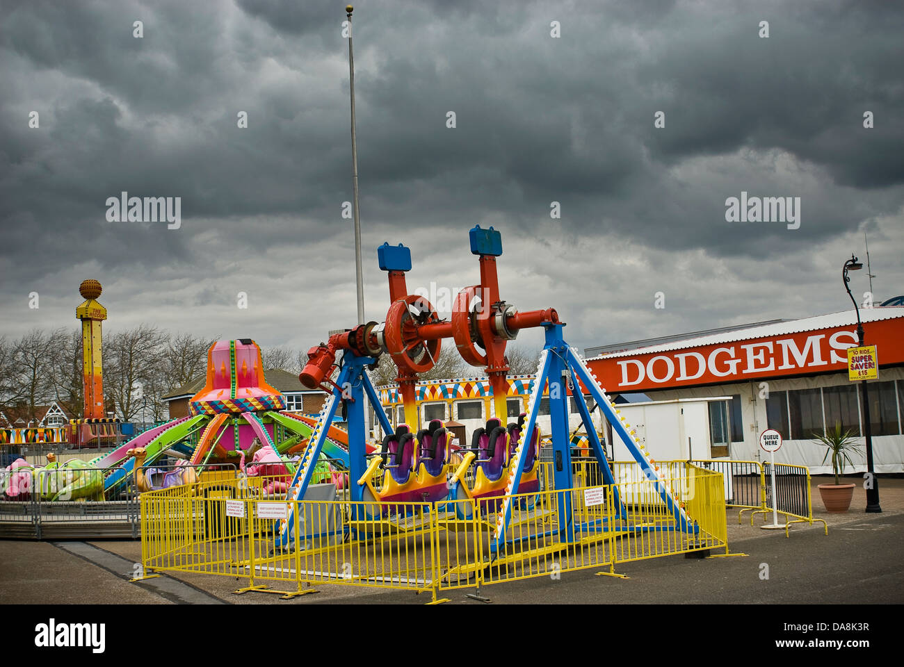 Closed down, deserted funfair rides out of season on Littlehampton Seafront, West Sussex, UK Stock Photo