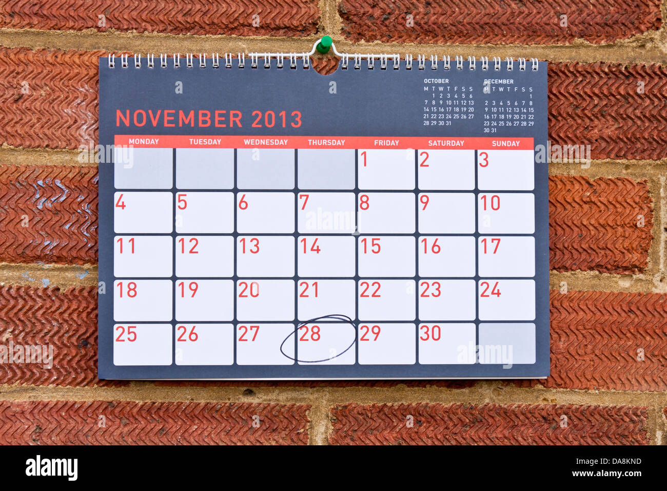 Monthly calendar hung on a wall with Thursday 28th November circled - Thanksgiving in the USA, 2013 Stock Photo