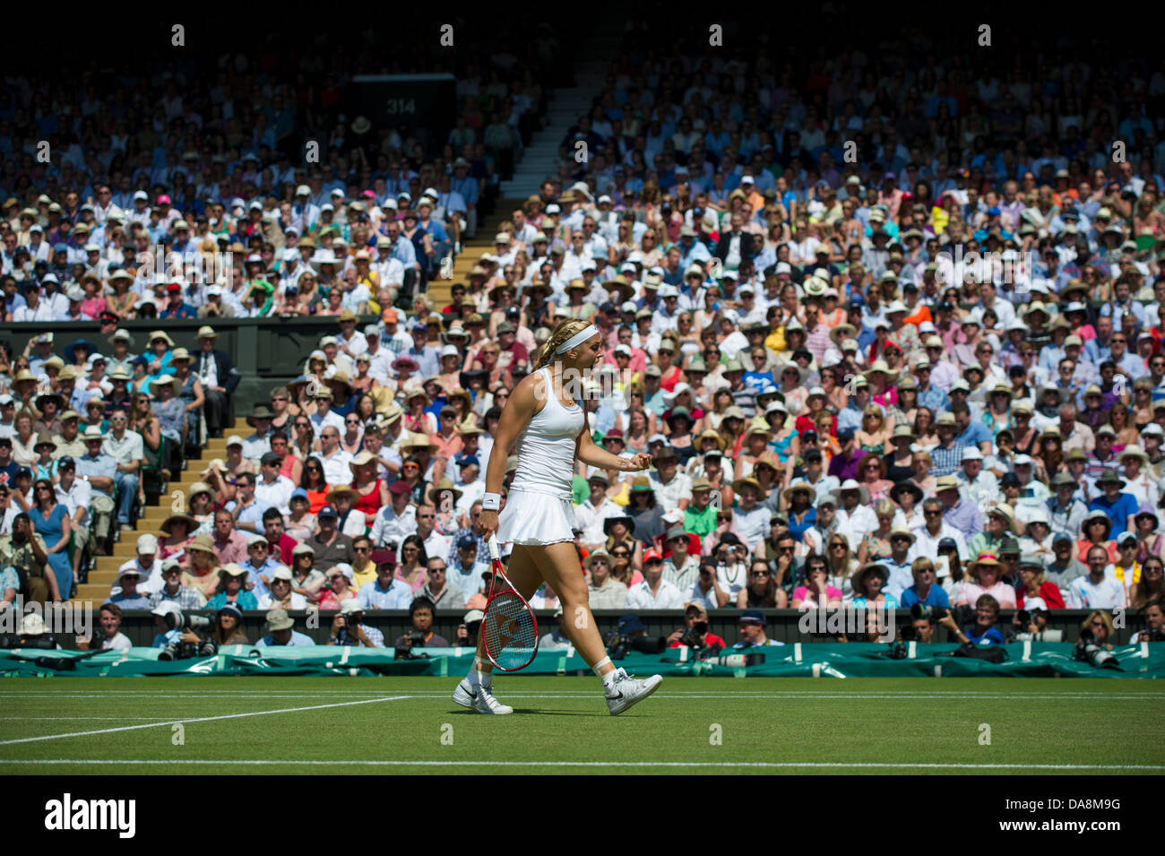 Tennis: Wimbledon Championship 2013, Sabine Lisicki of Germany in action during the Ladies' Singles final match against Marion Bartoli of France on day twelve of the Wimbledon Lawn Tennis Championships at the All England Lawn Tennis and Croquet Club on July 6, 2013 in London, England. Credit:  dpa picture alliance/Alamy Live News Stock Photo