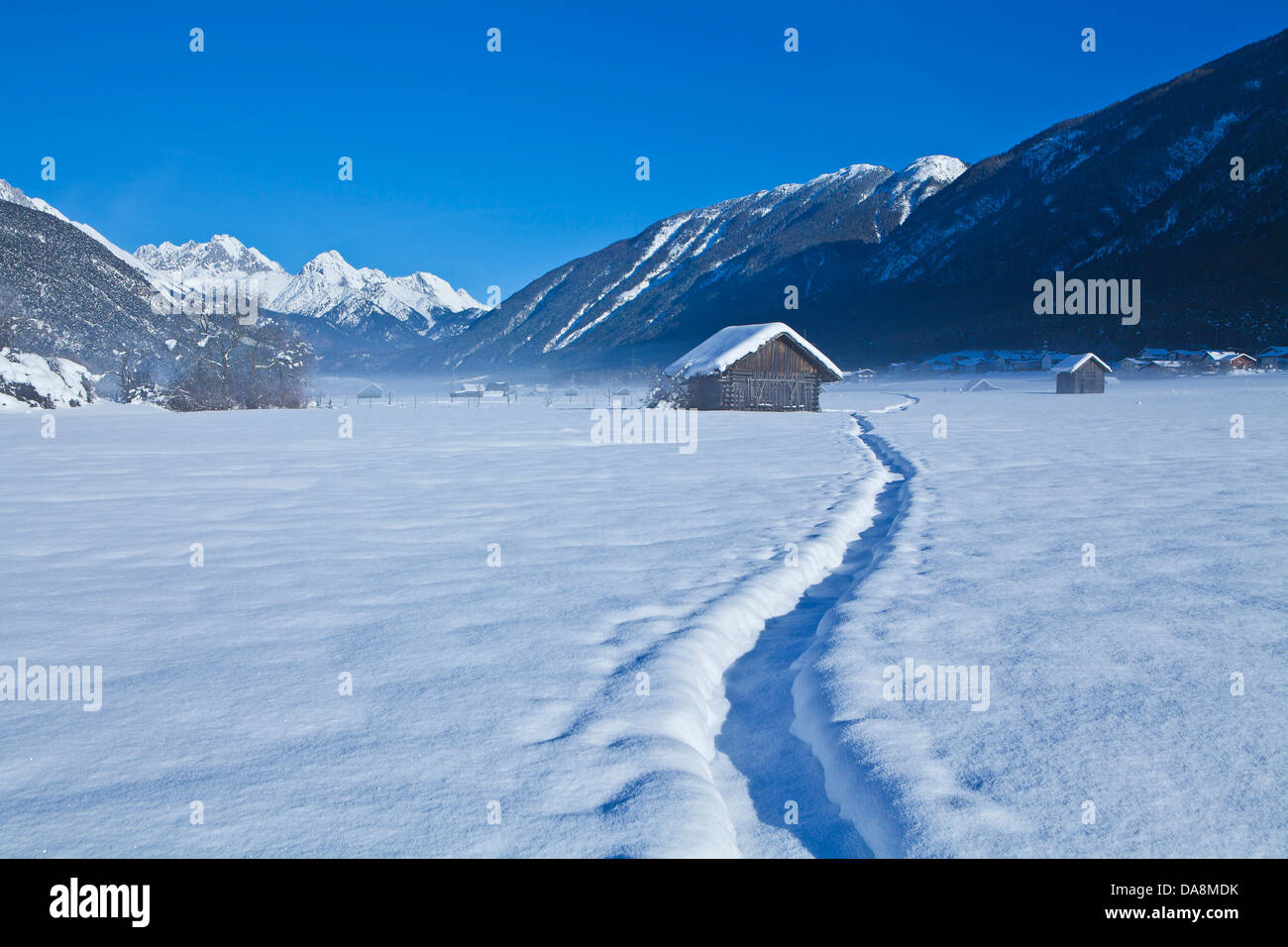 Austria, Europe, Tyrol, Gurgltal, Tarrenz, Imst, winter, Stadel, track, trace, Road-pure, snow, mountains, sky, wood, forest, bl Stock Photo