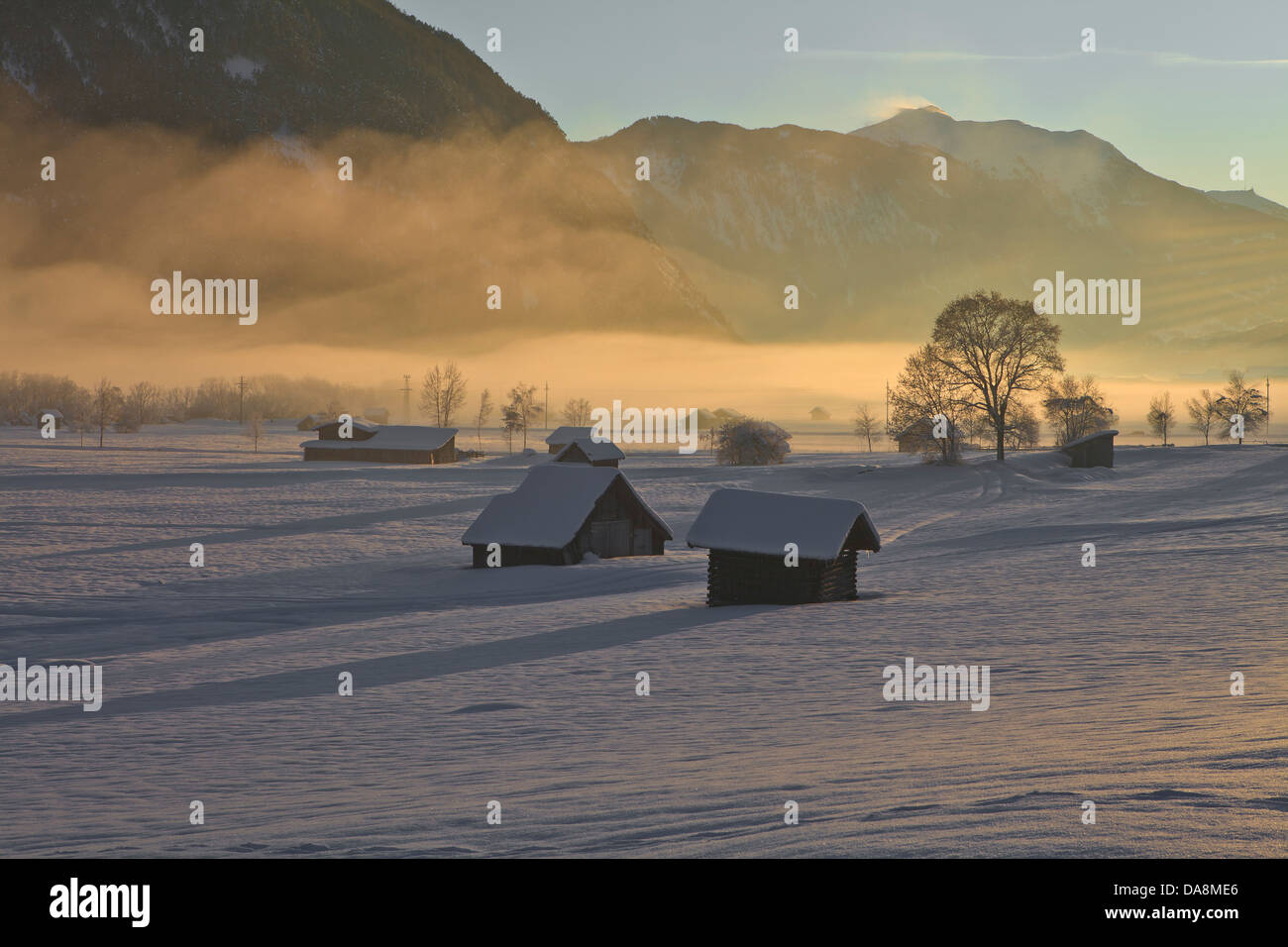 Austria, Europe, Tyrol, Gurgltal, Tarrenz, Imst, winter, evening, winter evening, Stadel, hay barn, ground fog, sun, evening sun Stock Photo