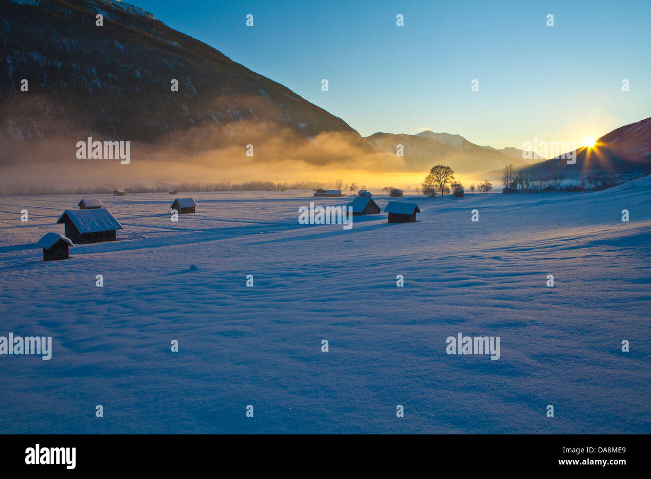 Austria, Europe, Tyrol, Gurgltal, Tarrenz, Imst, winter, Stadel, hay barn, fog, ground fog, mountains, sun, sun rays, sundown, b Stock Photo
