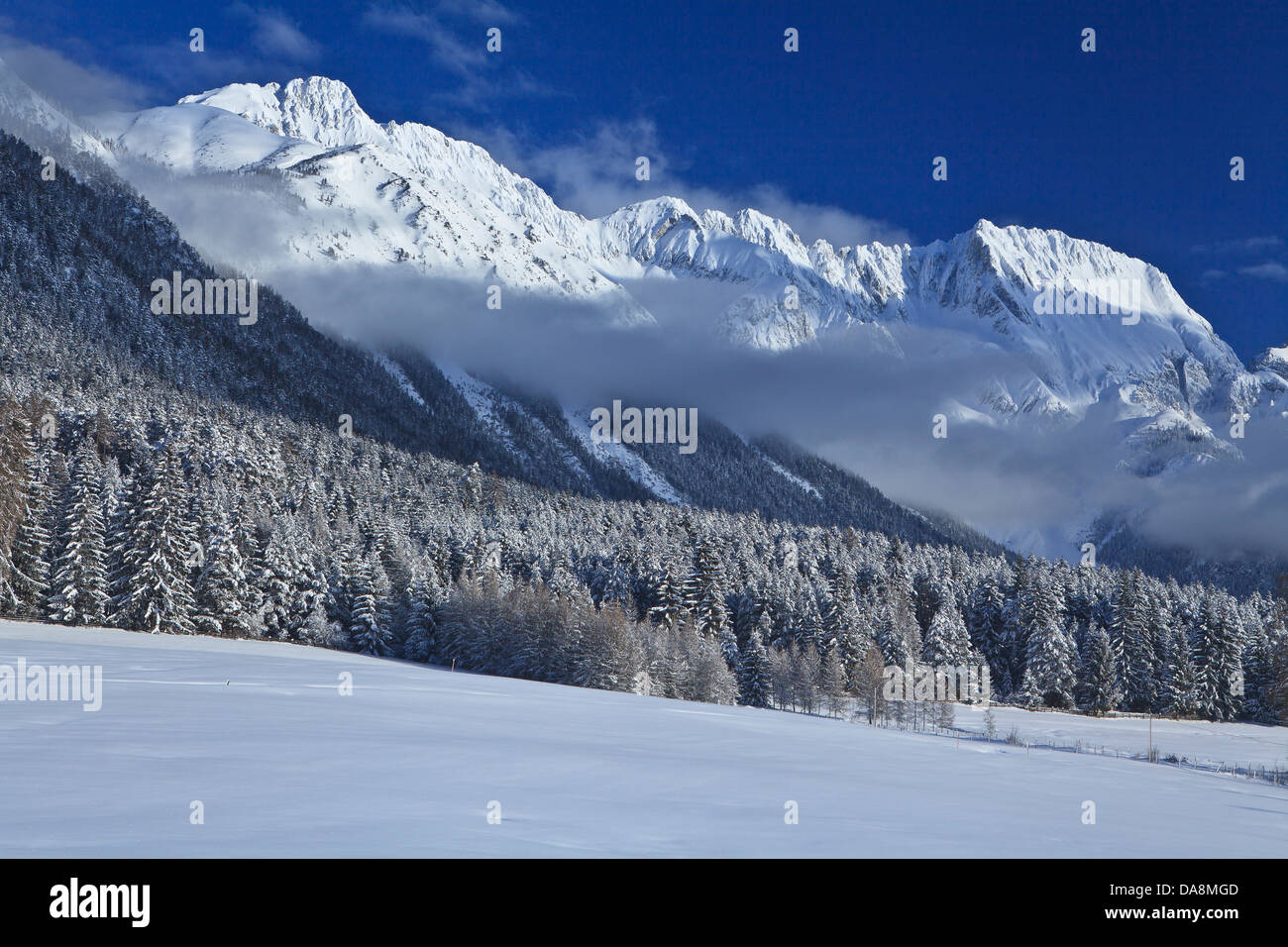 Austria, Europe, Tyrol, Mieminger plateau, Obsteig, winter, snow, fresh snowfall, mountains, Mieminger chain, Griesspitzen, Mitt Stock Photo