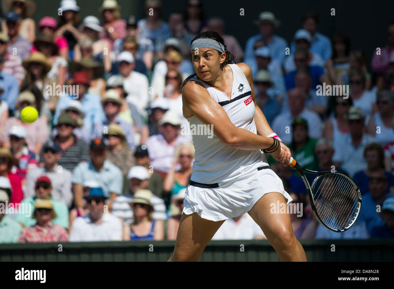 Tennis: Wimbledon Championship 2013, Marion Bartoli of France in action during the Ladies' Singles final match against Sabine Lisicki of Germany on day twelve of the Wimbledon Lawn Tennis Championships at the All England Lawn Tennis and Croquet Club on July 6, 2013 in London, England. Credit:  dpa picture alliance/Alamy Live News Stock Photo
