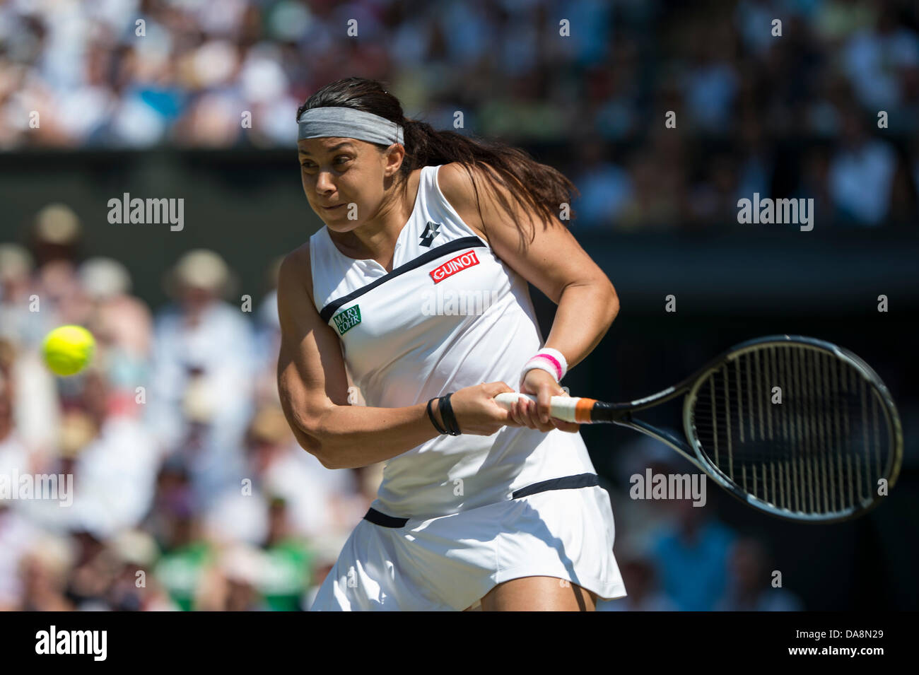 Tennis: Wimbledon Championship 2013, Marion Bartoli of France in action during the Ladies' Singles final match against Sabine Lisicki of Germany on day twelve of the Wimbledon Lawn Tennis Championships at the All England Lawn Tennis and Croquet Club on July 6, 2013 in London, England. Credit:  dpa picture alliance/Alamy Live News Stock Photo