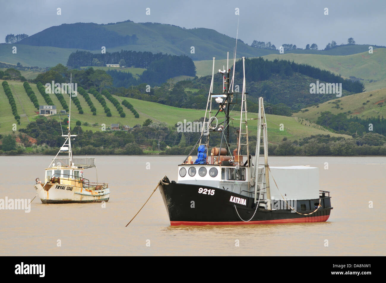 Commercial ships in Mangonui harbour Stock Photo