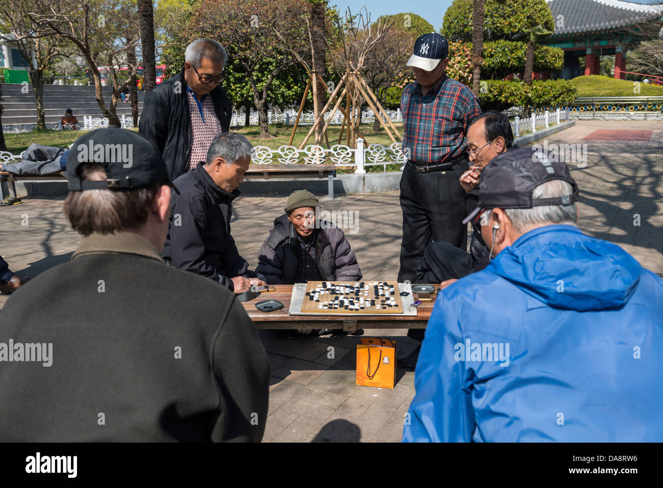 Retired Korean Gentlemen Playing the Board Game "Go" in Yongdusan Park