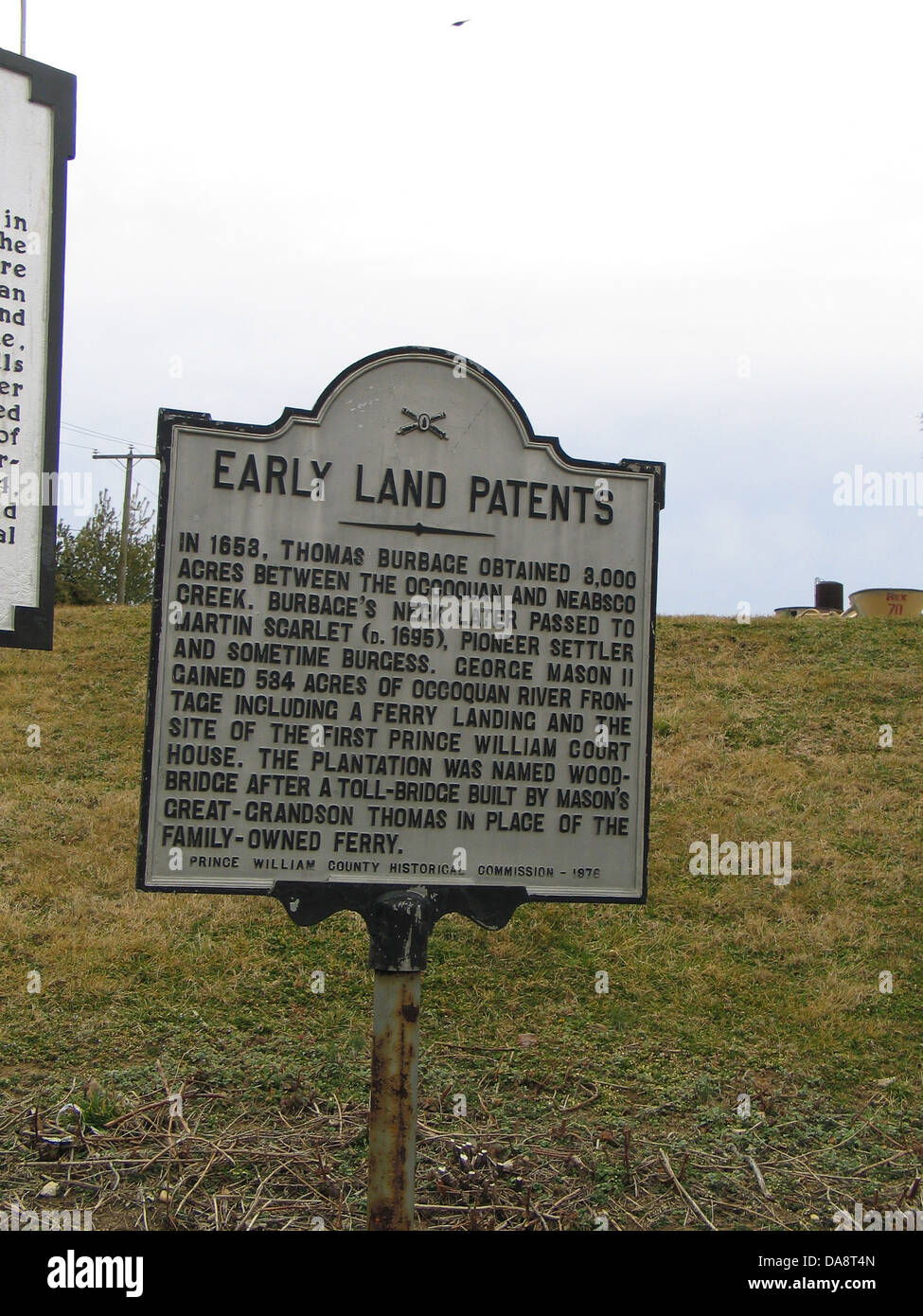 EARLY LAND PATENTS In 1653, Thomas Burbage obtained 8,000 acres between the Occoquan and Neabsco Creek. Burbage's Neck later passed to Martin Scarlet (D. 1695), pioneer settler and sometime Burgess, George Mason II gained 584 acres of Occoquan River frontage on the first Prince William Court House. The plantation was named Woodbridge after a toll-bridge built by Mason's great-grandson Thomas in place of the family-owned ferry. Prince William County Historical Commission - 1976 Stock Photo