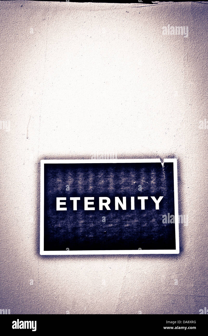 Eternity stamped on a wall Stock Photo