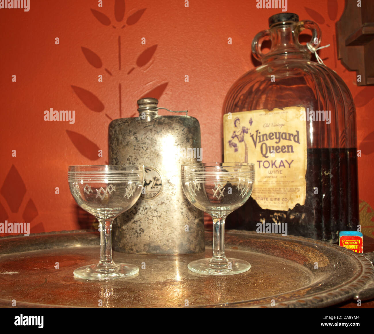 old and dusty flask, wine, glasses and tray Stock Photo Alamy