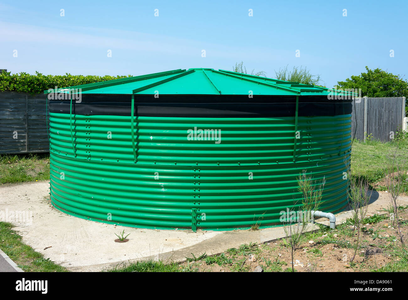 Large water storage tank as part of irrigation system Stock Photo