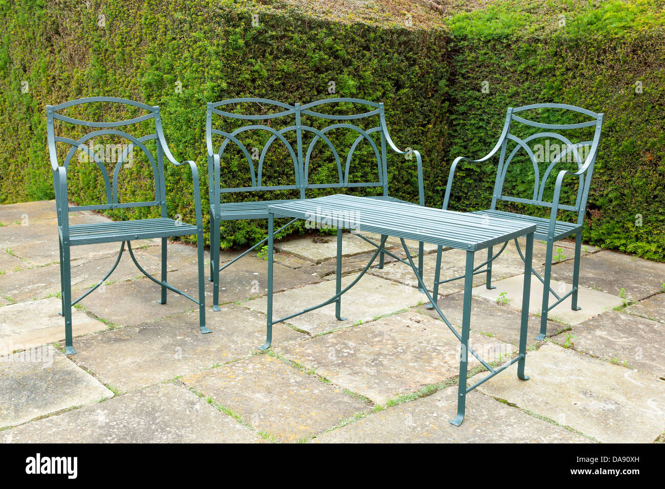 Set of patio furniture made of wrought iron Stock Photo Alamy
