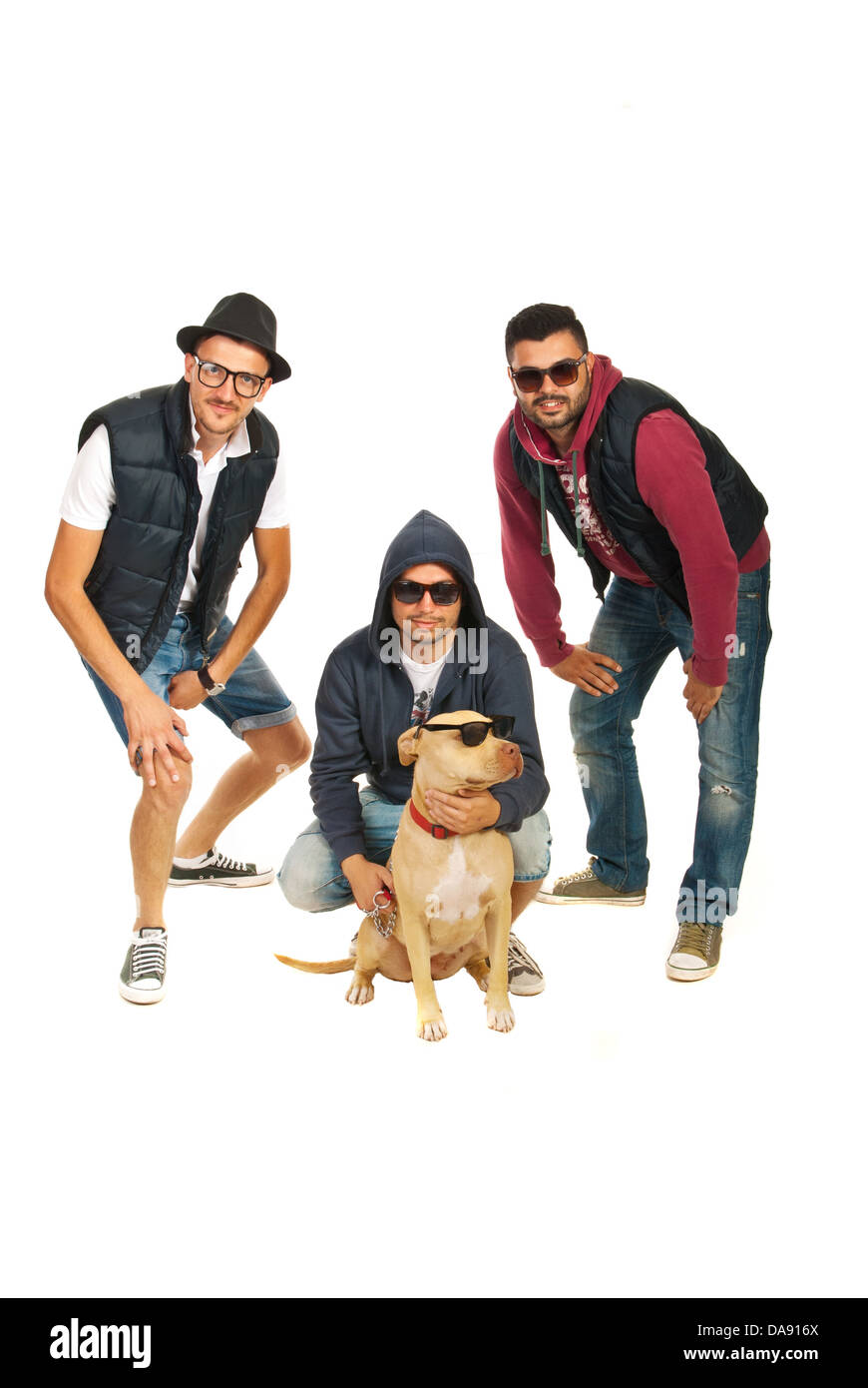 rappers band with pitbull dog with sunglasses isolated on white background Stock Photo