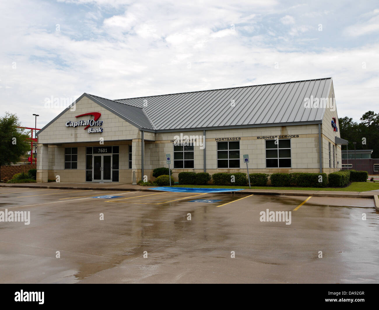 A Capital One Bank building after a rain storm. Stock Photo