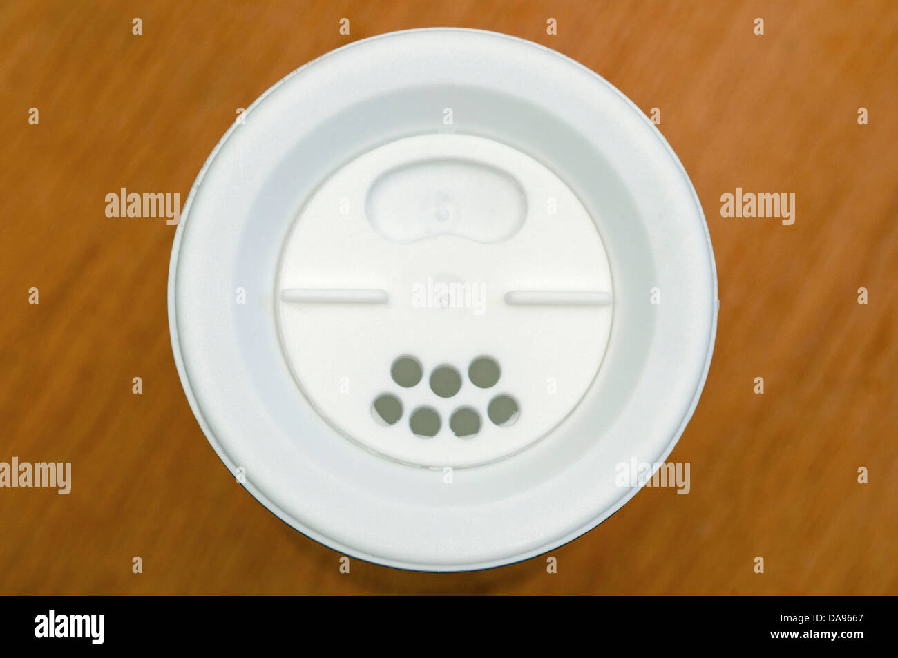 salt dispenser lid from above Stock Photo Alamy