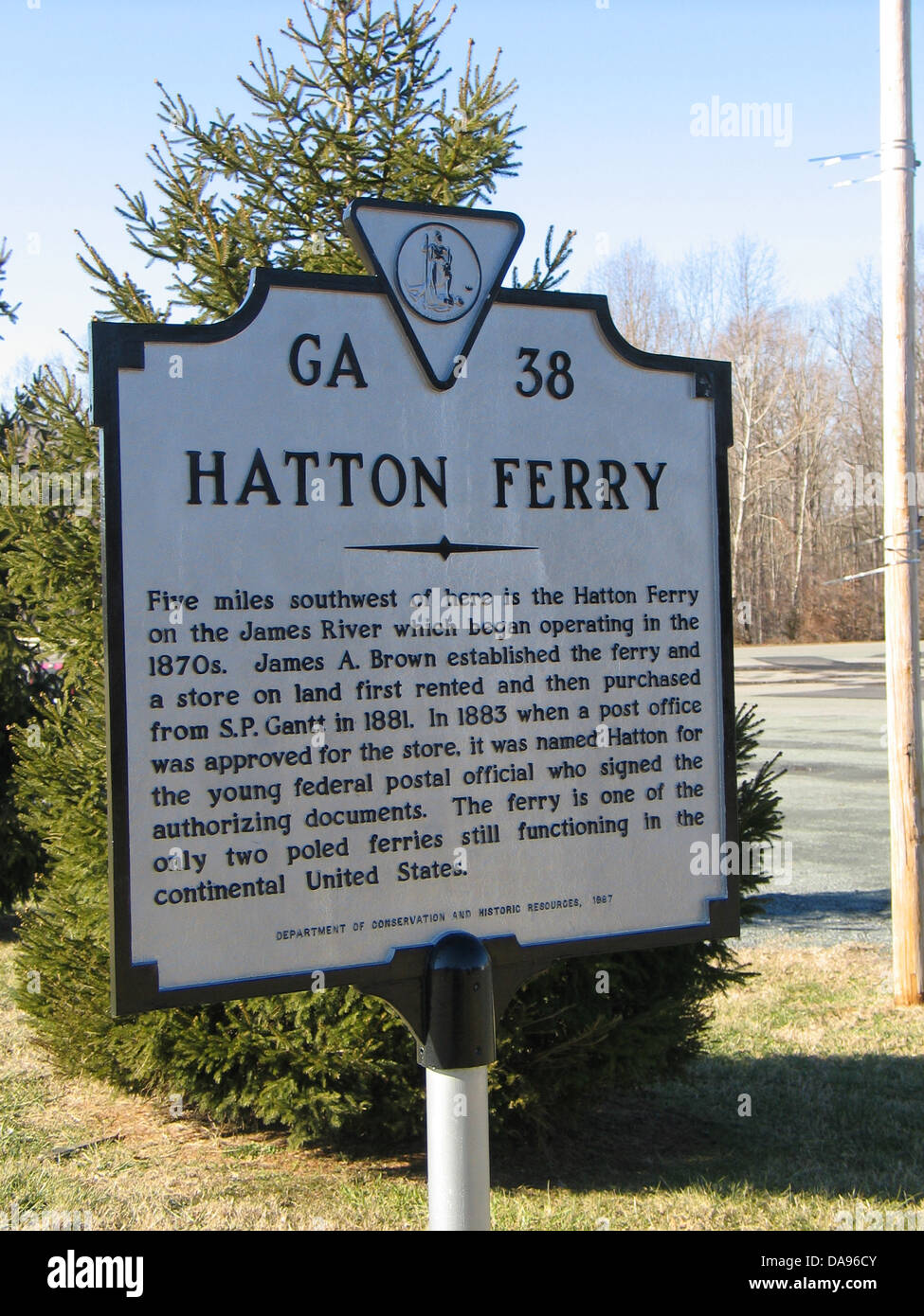 HATTON FERRY Five miles southwest of here is the Hatton Ferry which began operating in the 1870s. James A. Brown established the ferry and a store on land first rented and then purchased from S.P. Gantt in 1881. In 1883 when a post office was approved for the store, it was named Hatton for the young federal postal official who signed the authorizing documents. The ferry is one of the only two poled ferries still functioning in the continental United States. Department of Conservation and Historic Resources, 1987 Stock Photo