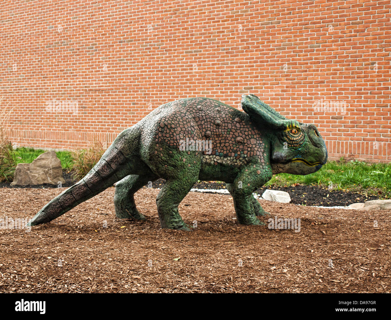 dinosaur statue for children to climb and play on Stock Photo Alamy