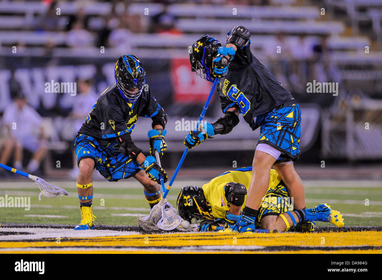 July 6, 2013 - Baltimore, MD, United States of America - July 6, 2013 Baltimore, MD.Several North All-Star players converge on the ball during the 8th Annual Under Armour All-American Lacrosse Classic at Johnny Unitas Stadium Baltimore on July 6, 2013..South defeats North 28-24. Stock Photo