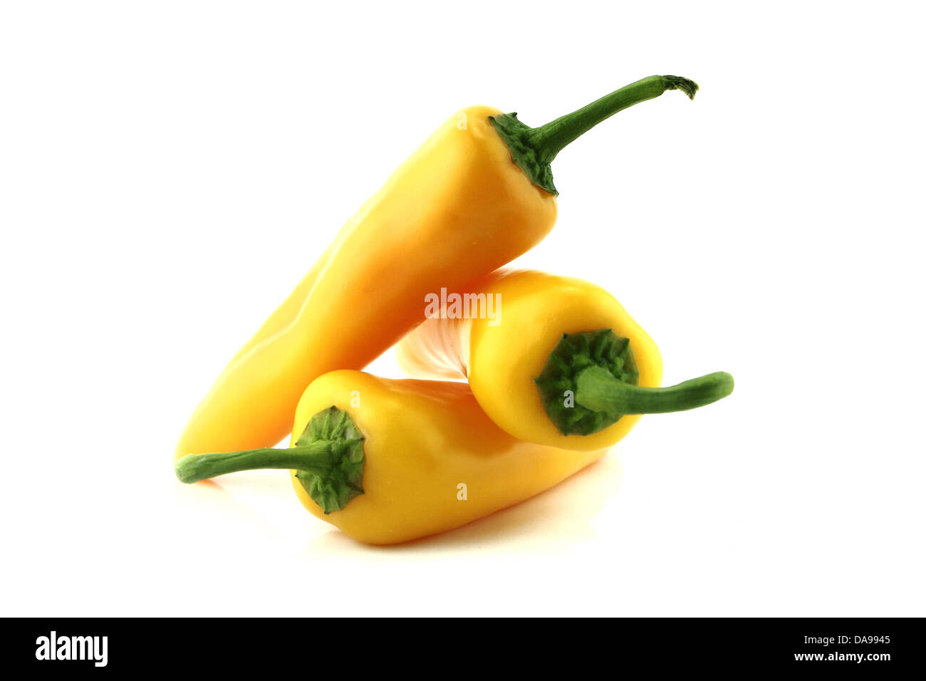 Yellow chili pepper on a white background Stock Photo - Alamy