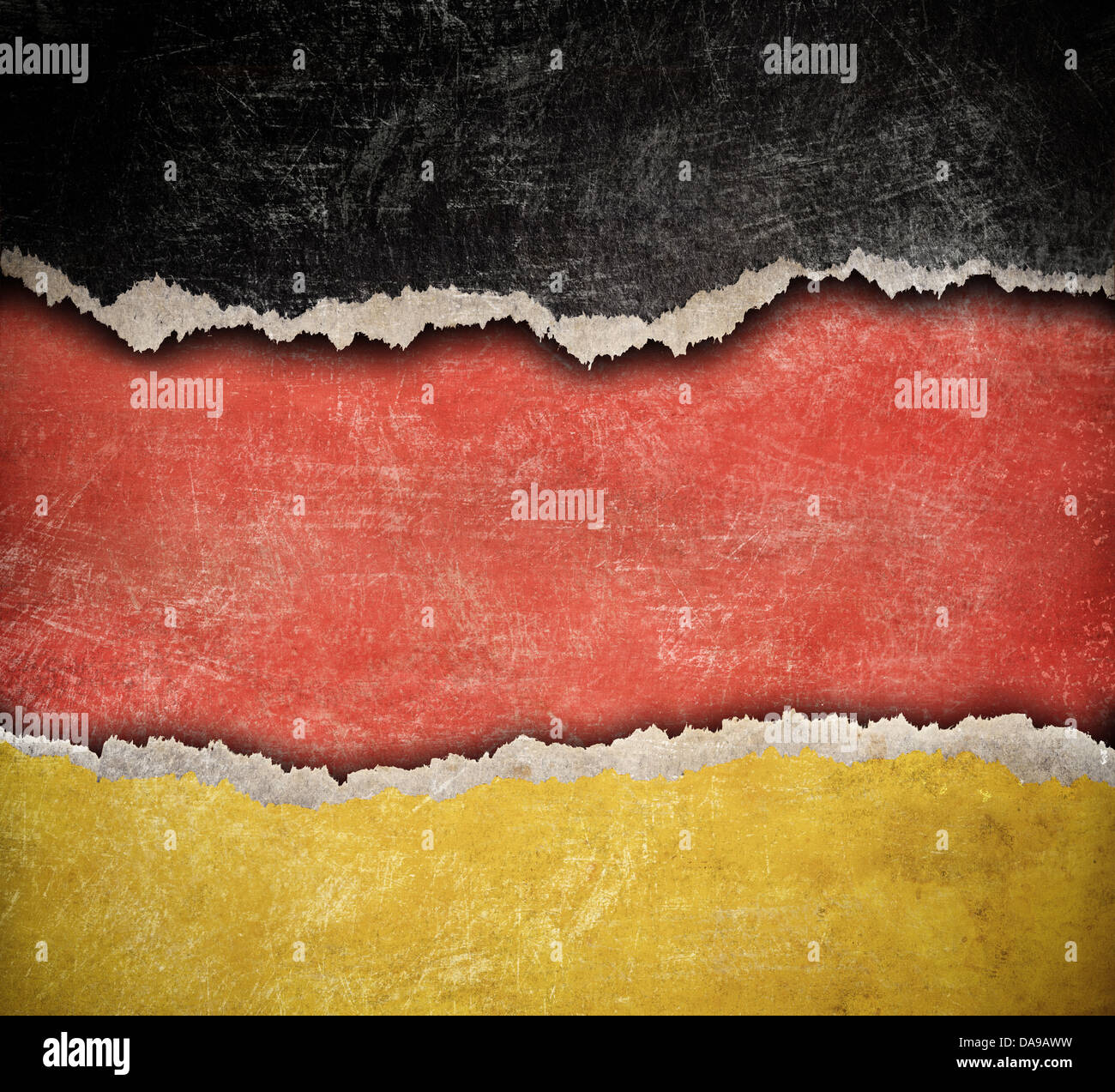 Grunge ripped paper German flag pattern Stock Photo
