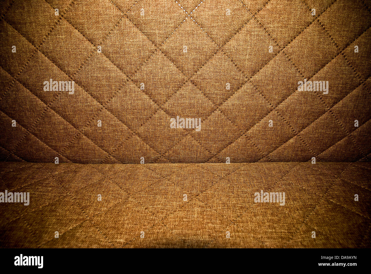 Brown quilted upholstery background or texture Stock Photo