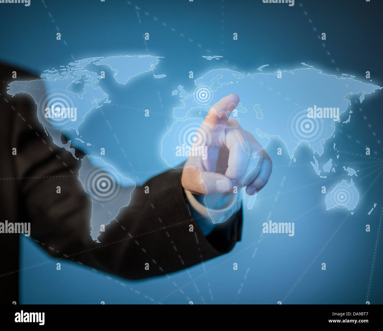 Man touching virtual world map by hand Stock Photo