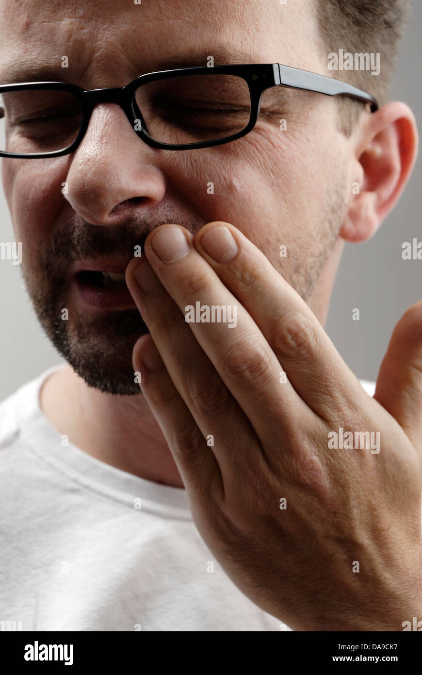 Man with toothache Stock Photo