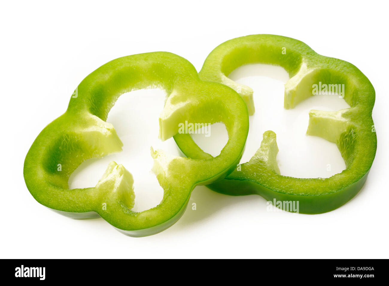 green pepper slice on white background Stock Photo - Alamy