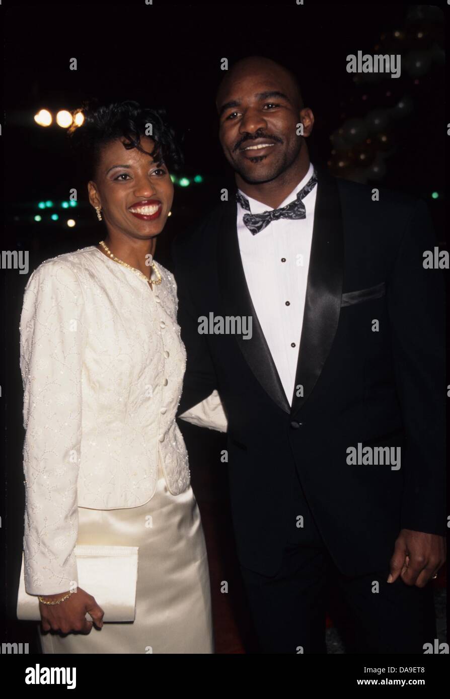 EVANDER HOLYFIELD with wife.The 28th annual NAACP Image awards in Los ...