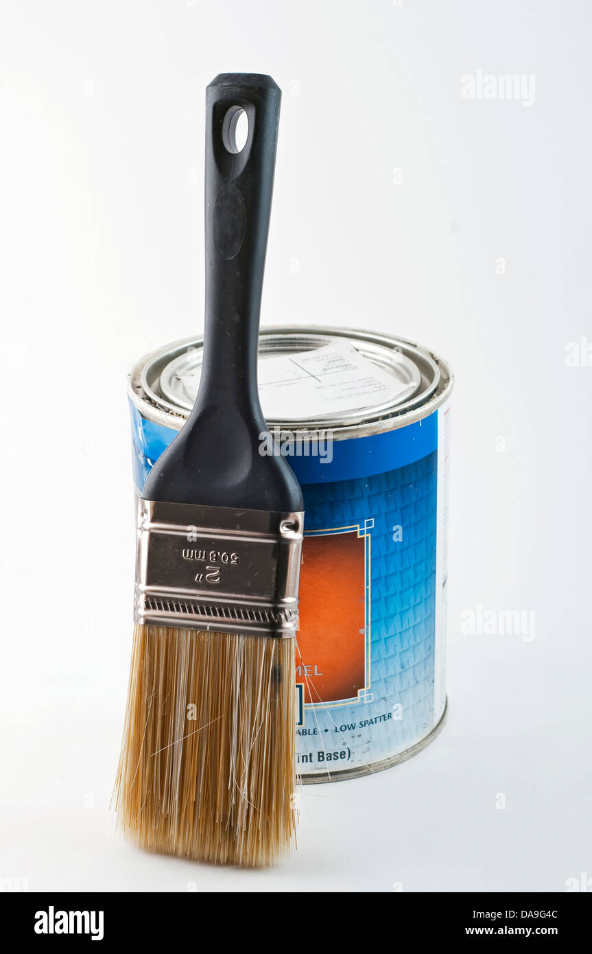 Quart can of interior paint with an application brush Stock Photo Alamy