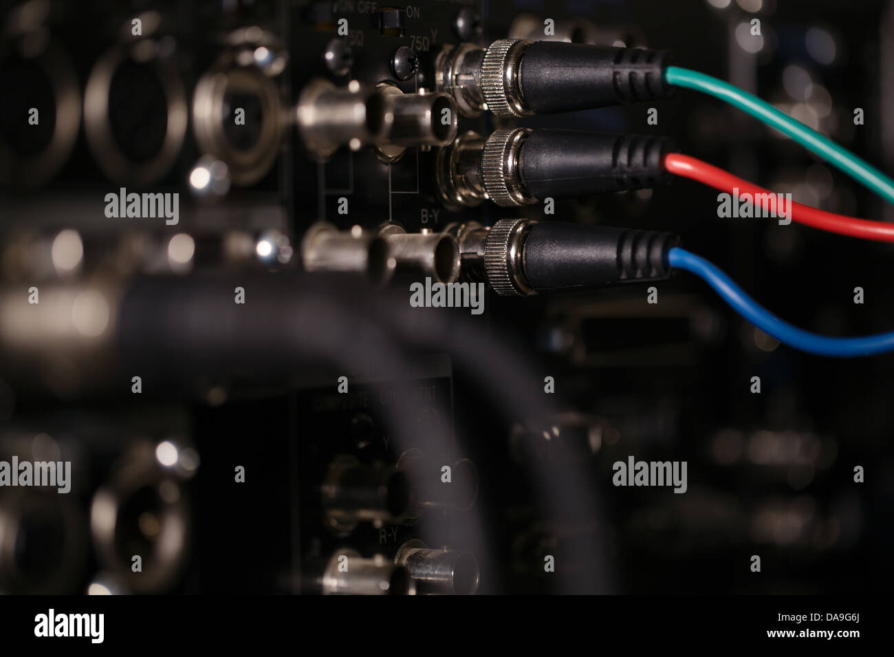 RGB video cables in the rear panel of the professional VCR. XLR audio