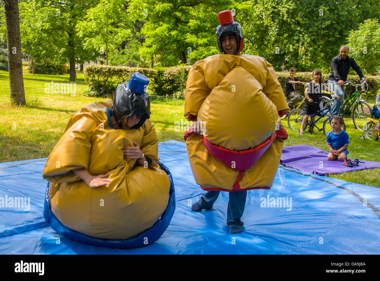 Paris, France, Young People, Two Sumo Wrestlers Play Fighting in Costume Outside in 'Bois de Vincennes' Fat Suits Stock Photo