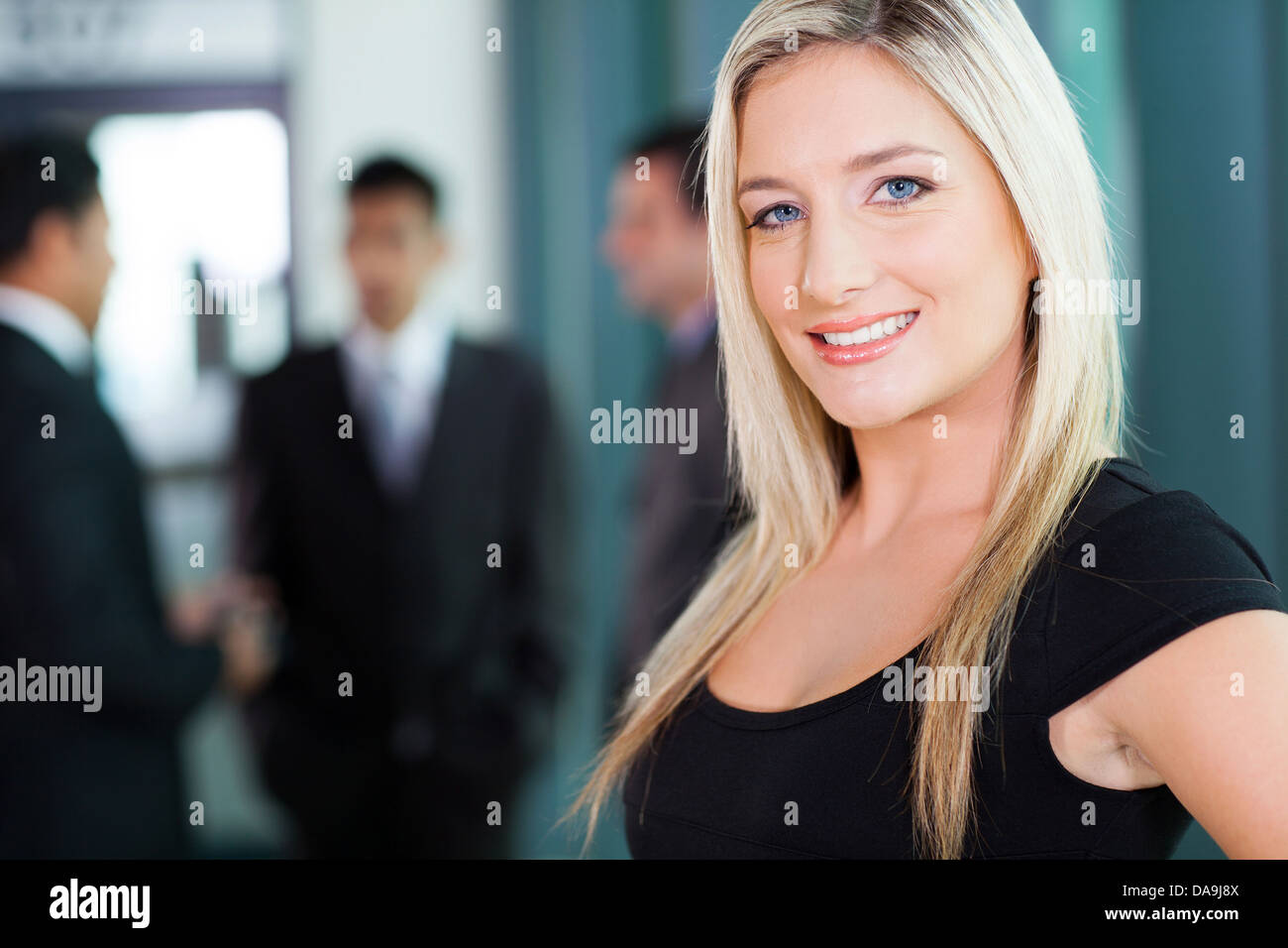 beautiful young businesswoman closeup portrait in office Stock Photo ...